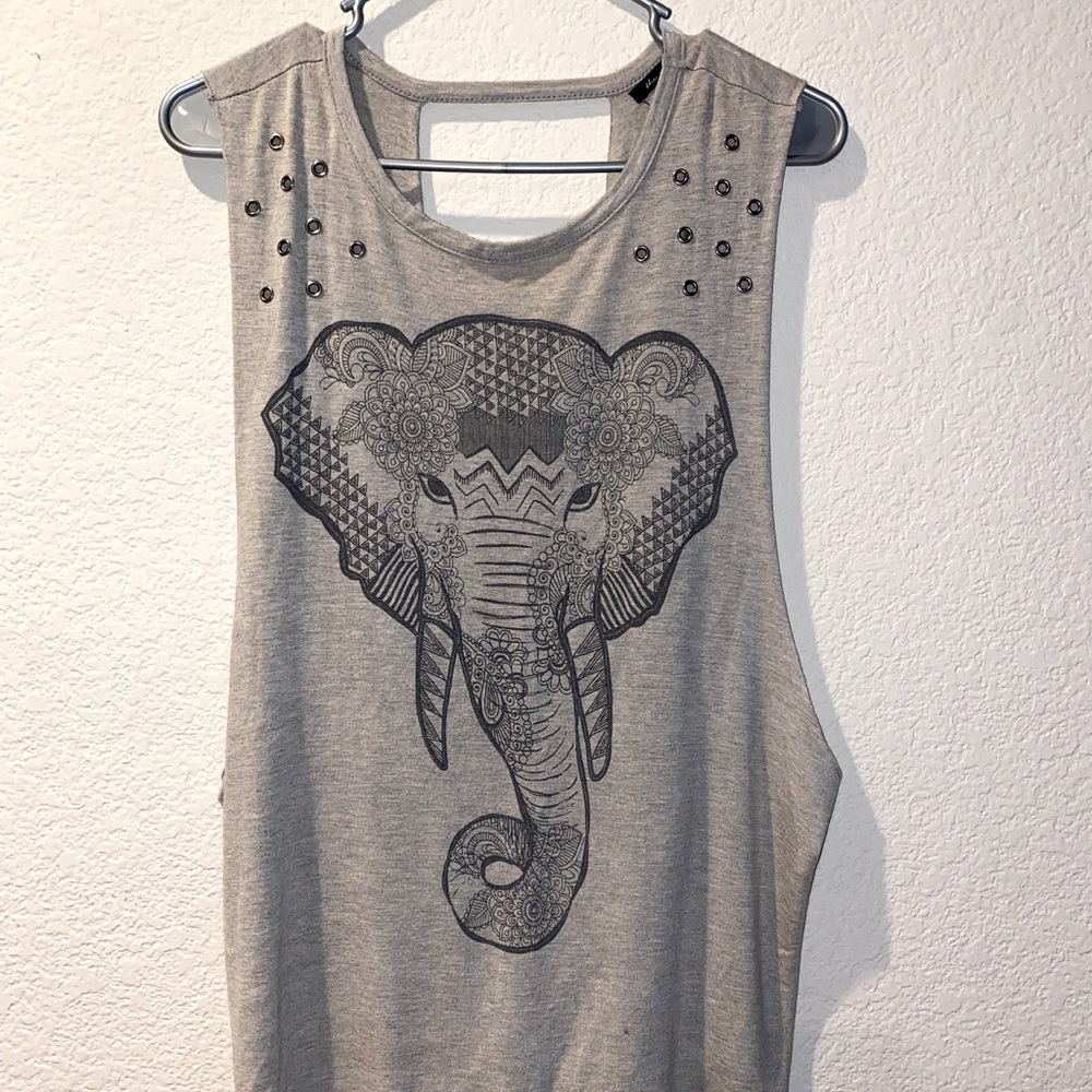 Light brown, elephant, loose shirt